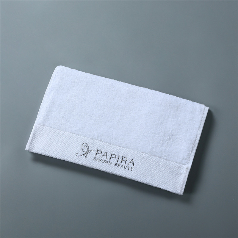 white embroidered logo hand towels