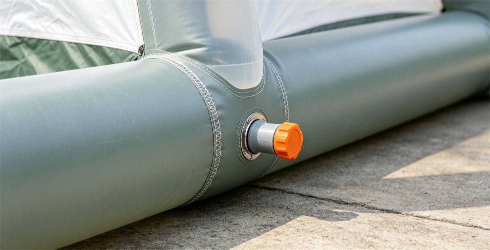 Close-up view of an air valve on an inflatable tent tube for procurement review and field shelter operations