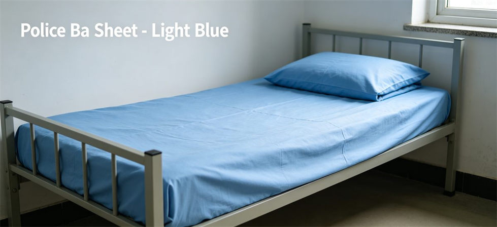 Light blue police bed sheet laid on sturdy metal cot, made of hardwearing fabric for government and institutional bulk procurement Light blue police bed sheet laid on sturdy metal cot, made of hardwearing fabric for government and institutional bulk procurement