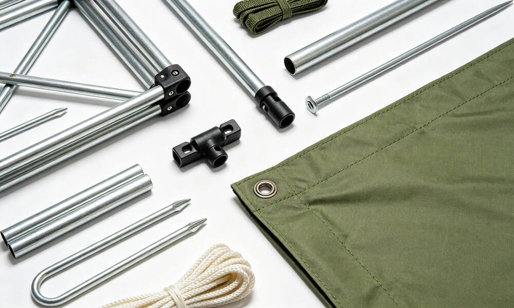 Emergency frame tent accessories and parts kit including steel ground stakes, nylon ropes, mallet and frame connectors