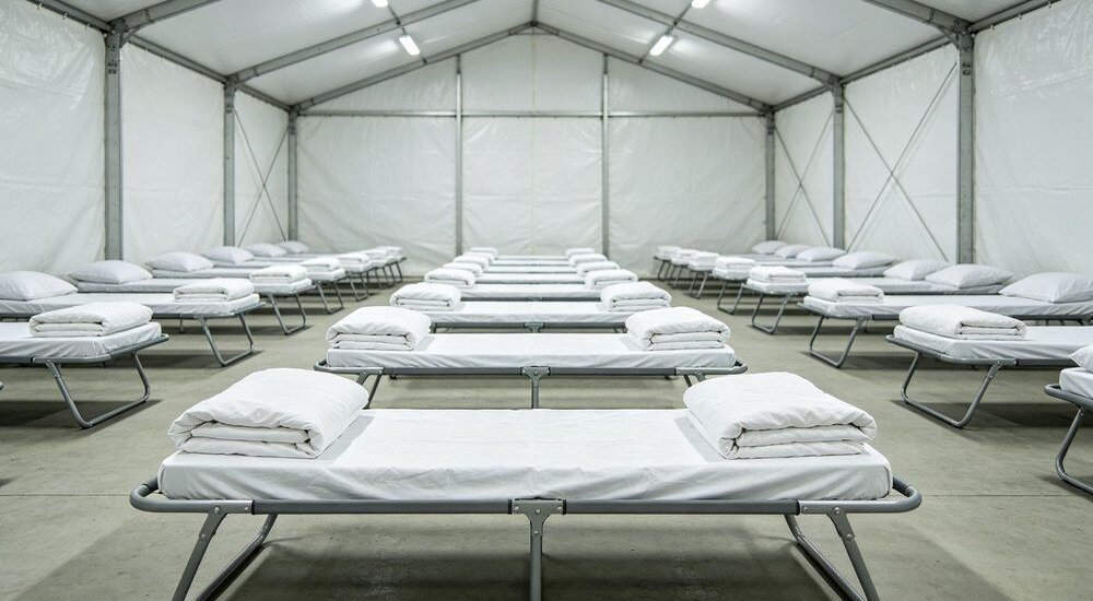 Emergency shelter tent with institutional bedding sets for disaster relief
