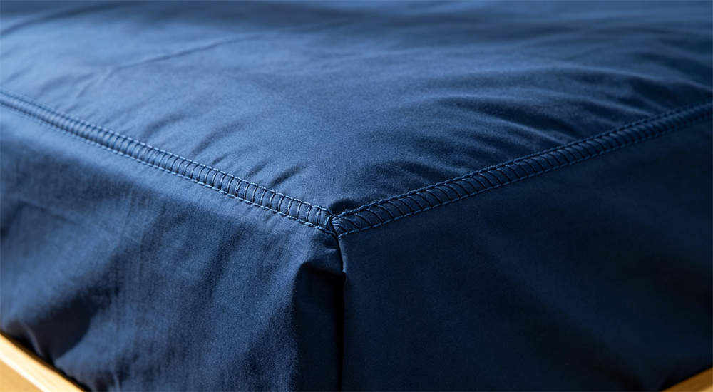 Reinforced stitching detail on school dormitory bedding for durability, strengthened seams for heavy usage Reinforced stitching detail on school dormitory bedding for durability, strengthened seams for heavy usage