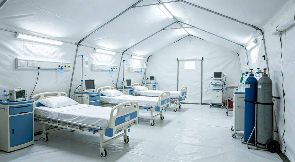 Large emergency shelter tent installed at disaster relief site providing weatherproof accommodation for affected populations with reinforced structure and quality materials visible Large emergency shelter tent installed at disaster relief site providing weatherproof accommodation for affected populations with reinforced structure and quality materials visible