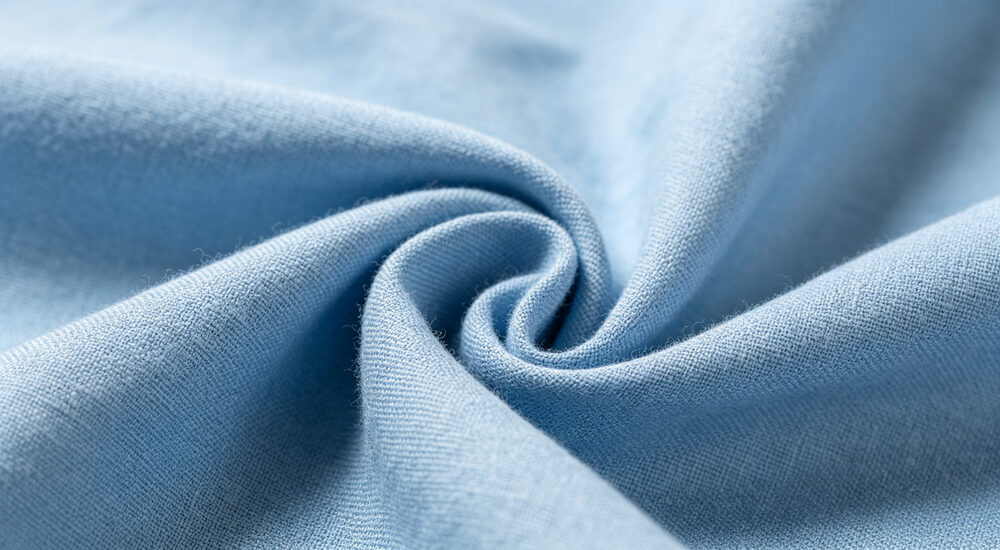 Institutional bedding product display showing material quality and design details for commercial procurement decision making suitable for emergency shelters hospitals universities and hotels requiring durable comfortable bedding solutions