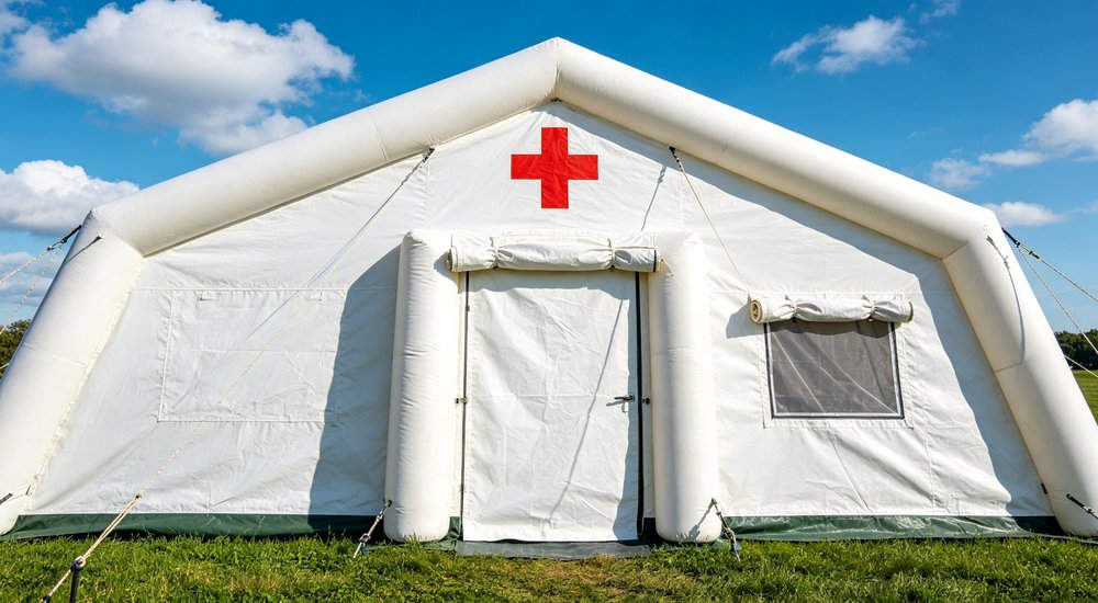 High-quality photo of a 30 square meter inflatable medical tent interior panoramic view showing spacious layout in white color with red cross medical markings