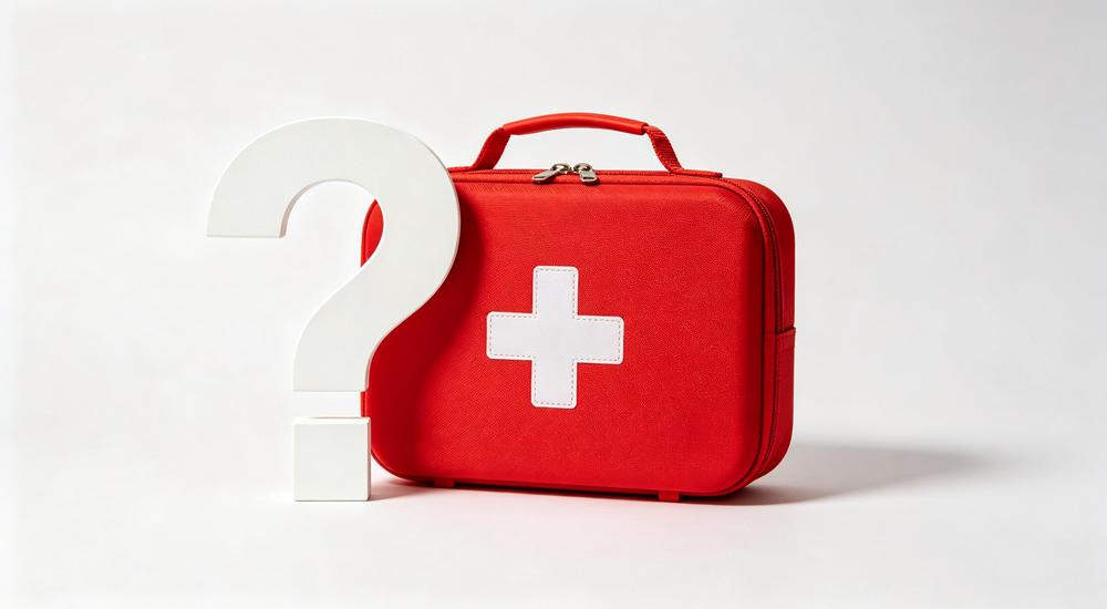 Clean graphic shot of large white question mark beside red first aid kit with white cross on pure white background