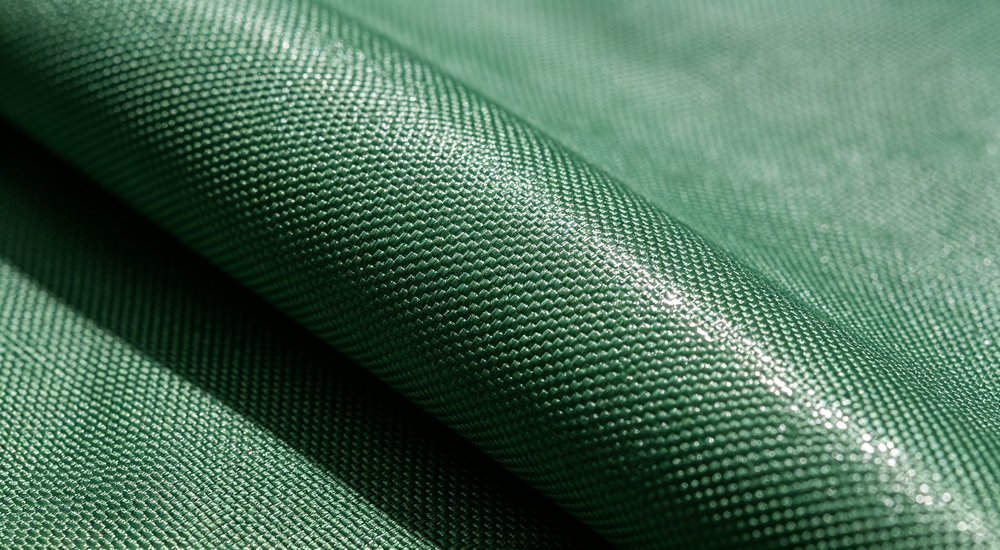 1000D airtight PVC fabric for air beams, close-up texture, product shot red and white inflatable emergency tent for disaster relief operations
