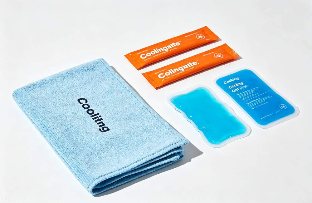 Bulk extreme heat cooling kit flat lay with PVA towels gel ice packs and electrolyte packets for wholesale