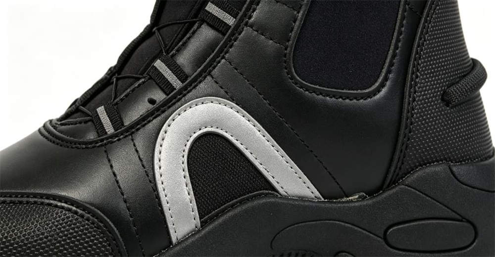 Close-up of deep lug outsole on rapid entry water rescue boots, designed for maximum traction on wet rocky and uneven terrain Close-up of deep lug outsole on rapid entry water rescue boots, designed for maximum traction on wet rocky and uneven terrain