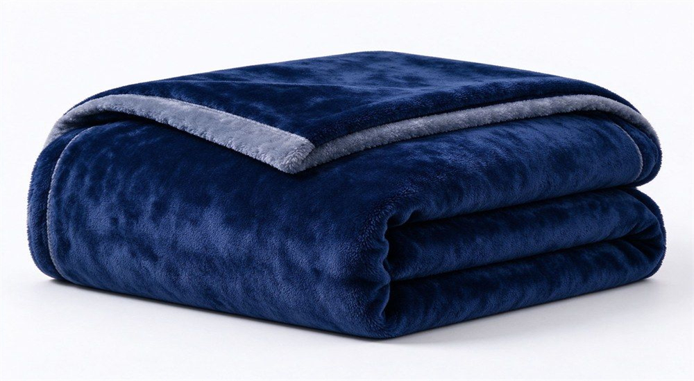 Navy blue raschel school blanket folded on white background for school blanket wholesale, showing soft raschel knit fabric for dormitory bedding supply to boarding schools