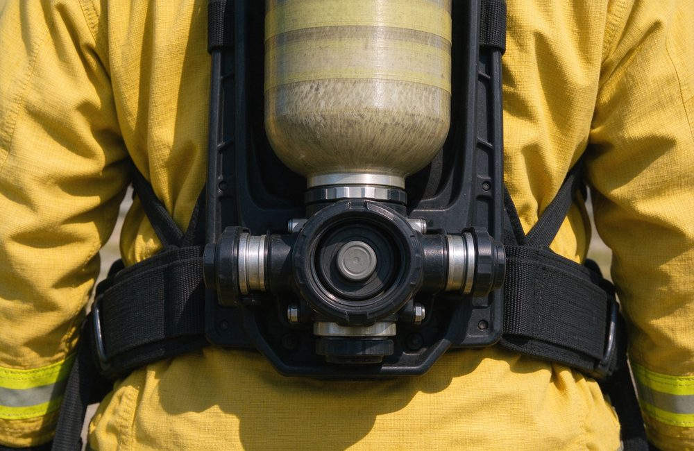 Close-up view of chemical suit glove and boot integration for firefighter hazmat suit complete sealing and yellow sealed fire resistant chemical suit accessory compatibility for fire brigade procurement