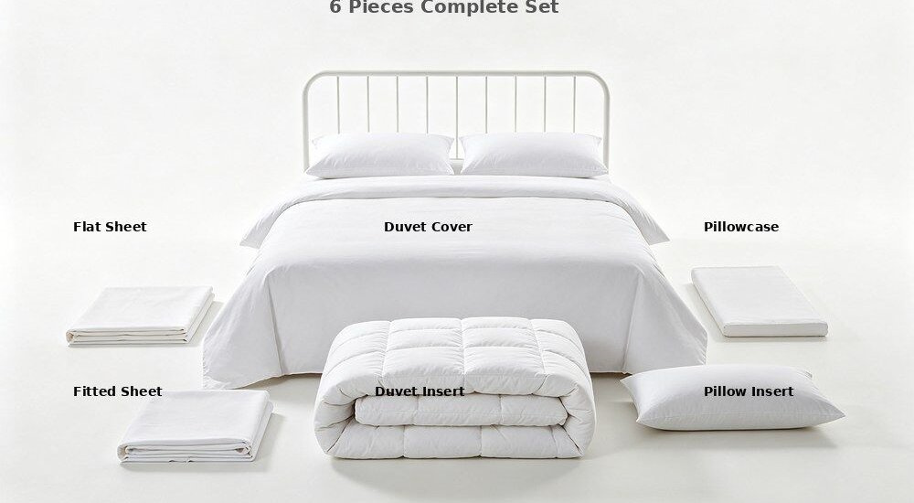 Overhead view of clean white hospital scene with neatly made institutional bulk bedding on rows of beds, fresh sheet and duvet cover sets for wholesale healthcare and dormitory linen supply in a bright room