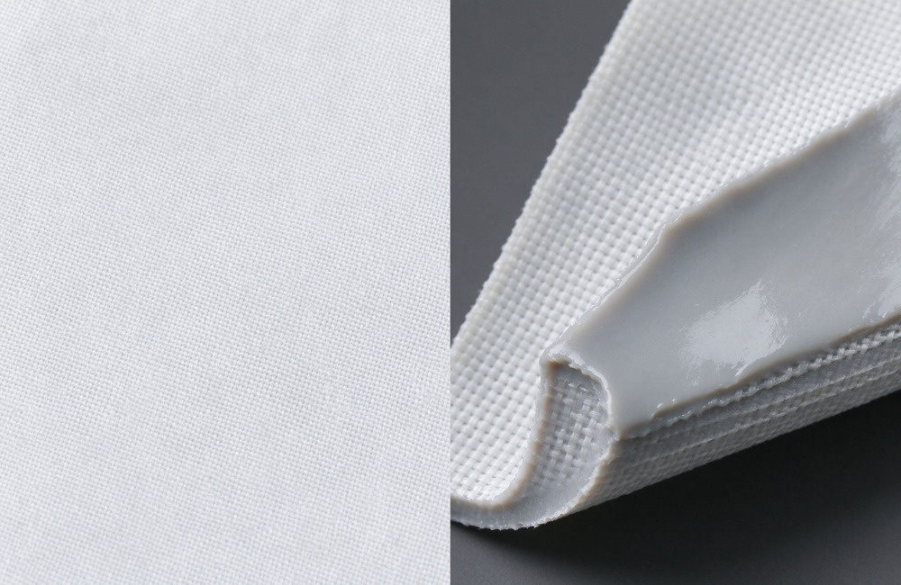 Macro close-up showing layered cross-section of a white fiberglass fire blanket with visible woven glass fiber grid texture and a separate glossy silicone coated sample strip beside it, clean white surface