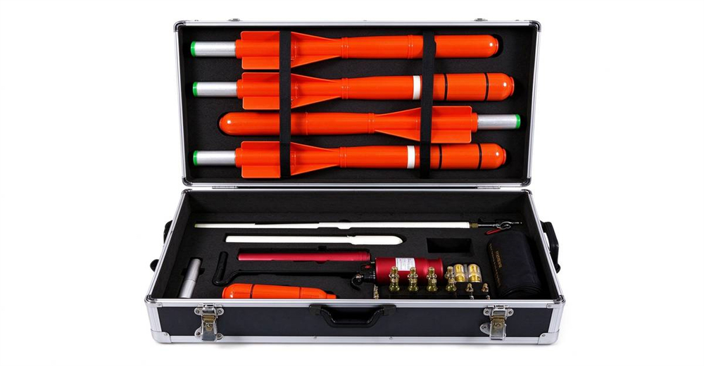 Portable CO2 pneumatic line thrower in open aluminum case with orange rockets and accessories manufactured by YRF China supplier as complete rescue equipment for government and NGO procurement Portable CO2 pneumatic line thrower in open aluminum case with orange rockets and accessories manufactured by YRF China supplier as complete rescue equipment for government and NGO procurement