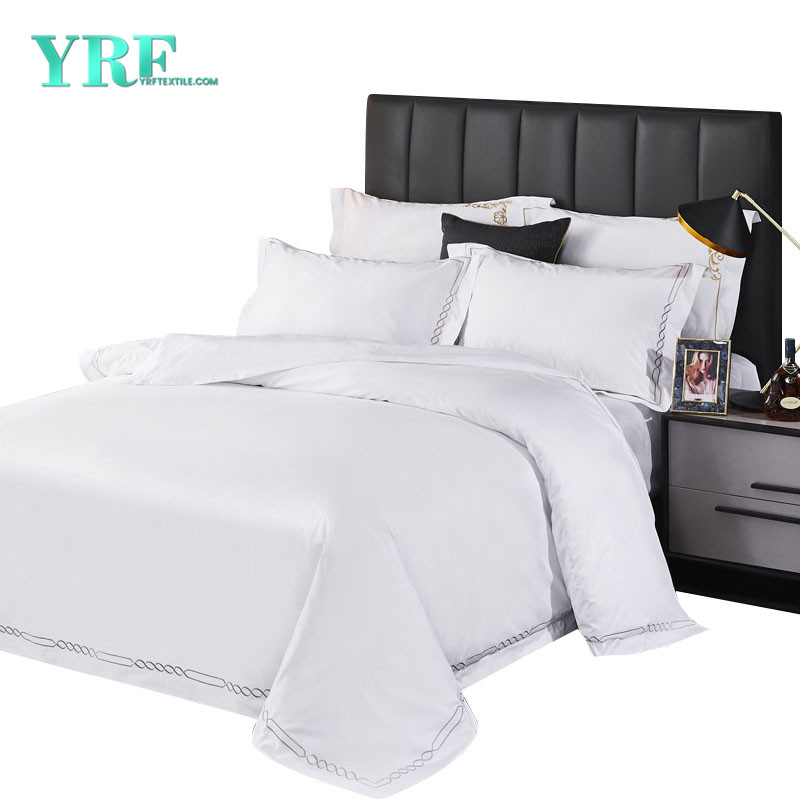 Why are hotel bedding in white or light colors?
